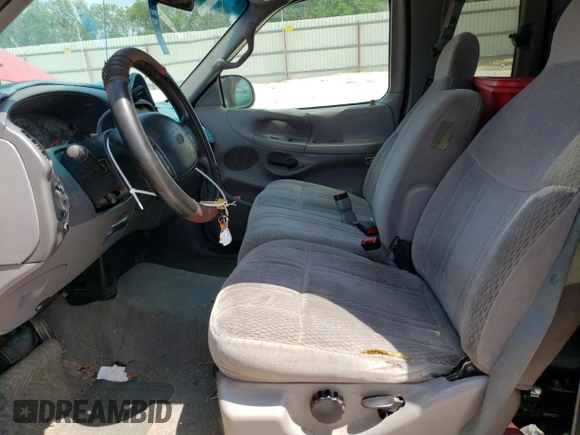 1998 Ford F-150 with VIN 1FTZX1761WKA53404, listed as a Copart auction lot 80628524 with 253,399 mi miles and Salvage title. Bid and sale history available at DreamBid. Image 7.