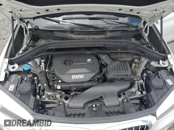 2018 BMW X1 xDrive28i with VIN WBXHT3C35J5L29298, listed as a Copart auction lot 59041435 with 27,612 mi miles and Salvage title. Bid and sale history available at DreamBid. Image 12.
