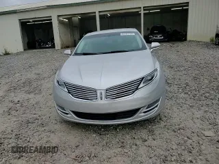 2015 Lincoln MKZ z VIN 3LN6L2GK4FR613117, wystawiony jako Copart lot #54141735 z przebiegiem 129 072 mil mil oraz Szkoda całkowita • Salvage title. Historia ofert i sprzedaży dostępna na DreamBid. Obrazek 13.