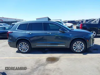 2021 Cadillac XT6 Premium Luxury with VIN 1GYKPERS0MZ110029, listed as a IAAI auction lot 41669104 with 58,890 mi miles and . Bid and sale history available at DreamBid. Image 13.