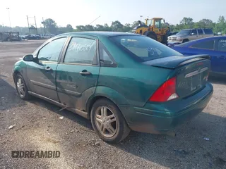 2000 Ford Focus SE with VIN 1FAFP3431YW273376, listed as a IAAI auction lot 39471057 with 214,968 mi miles and . Bid and sale history available at carsss.com. Image 3.