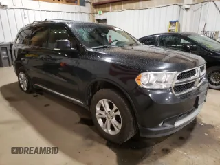 2012 Dodge Durango Crew with VIN 1C4SDJDT0CC323006, listed as a Copart auction lot 63631985 with 126,521 mi miles and Salvage title. Bid and sale history available at DreamBid. Image 4.