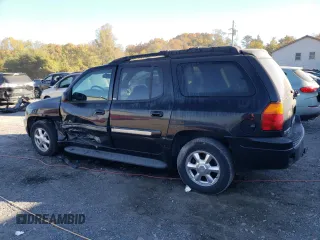 2004 GMC Envoy SLT with VIN 1GKET16S446131726, listed as a Copart auction lot 76033954 with Not Provided miles and Salvage Title. Bid and sale history available at DreamBid. Image 2.
