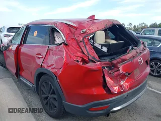 2016 Mazda CX-9 Grand Touring with VIN JM3TCADY0G0107481, listed as a IAAI auction lot 42043612 with Not Provided miles and . Bid and sale history available at DreamBid. Image 3.