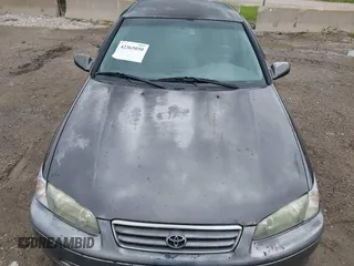 2000 Toyota Camry CE z VIN JT2BG22K3Y0530823, wystawiony jako IAAI lot #42365050 z przebiegiem 148 913 mil mil oraz . Historia ofert i sprzedaży dostępna na DreamBid. Obrazek 6.