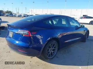 2023 Tesla Model 3 with VIN 5YJ3E1EA6PF505252, listed as a IAAI auction lot 41380172 with 31,141 mi miles and . Bid and sale history available at DreamBid. Image 4.