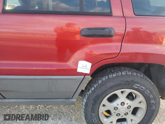2002 Jeep Grand Cherokee with VIN 1J8GX38S82C176323, listed as a Copart auction lot 78520444 with 206,258 mi miles and Salvage title. Bid and sale history available at DreamBid. Image 13.