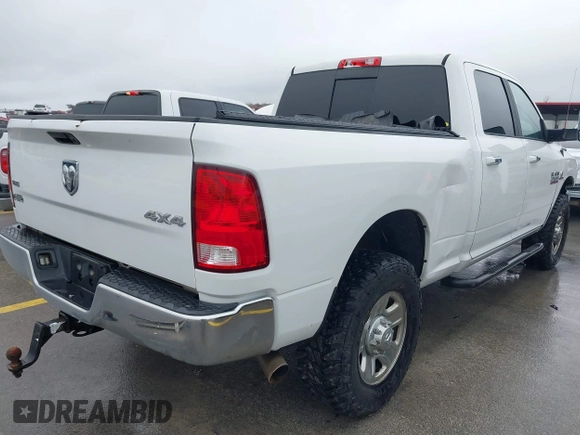 2017 Ram 2500 SLT with VIN 3C6UR5DL3HG673971, listed as a IAAI auction lot 41564109 with 159,214 mi miles and . Bid and sale history available at DreamBid. Image 4.