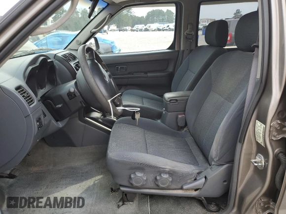 2004 Nissan Frontier XE with VIN 1N6ED29X64C478172, listed as a Copart auction lot 49031985 with 210,354 mi miles and Salvage title. Bid and sale history available at DreamBid. Image 7.