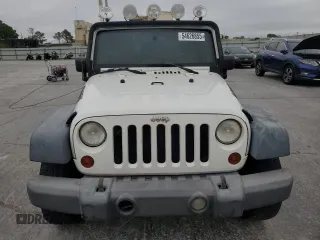 2009 Jeep Wrangler X with VIN 1J4FA24139L716919, listed as a Copart auction lot 54626855 with 211,943 mi miles and Clean Title. Bid and sale history available at DreamBid. Image 5.