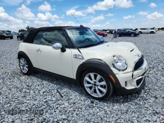 2015 MINI Convertible S с VIN WMWZP3C50F2A91635, выставлен на аукционе Copart как лот 61482285 с пробегом 105 437 миль миль и Списание • Salvage title. История ставок и продаж доступна на DreamBid. Изображение 4.