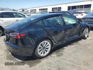 2023 Tesla Model 3 с VIN 5YJ3E1EA7PF458510, выставлен на аукционе Copart как лот 63921795 с пробегом 70 726 миль миль и Списание • Salvage title. История ставок и продаж доступна на DreamBid. Изображение 3.