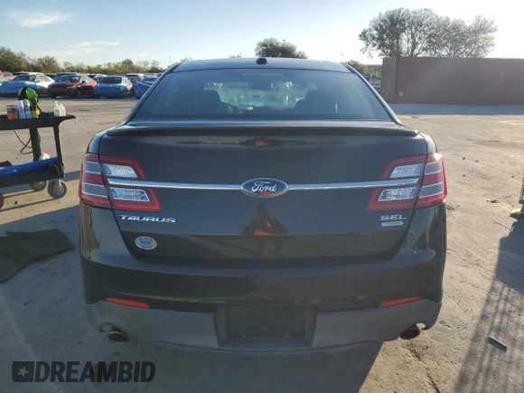 2013 Ford Taurus SEL with VIN 1FAHP2E96DG190228, listed as a Copart auction lot 87371464 with Not Provided miles and Clean Title. Bid and sale history available at carsss.com. Image 6.