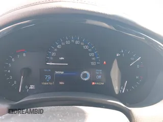 2014 Cadillac XTS with VIN 2G61L5S3XE9231858, listed as a IAAI auction lot 41941564 with 158,479 mi miles. Bid and sale history available at carsss.com. Image 7.