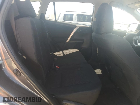 2018 Toyota RAV4 LE z VIN JTMBFREV8JJ259069, wystawiony jako Copart lot #61106715 z przebiegiem 56 770 mil mil oraz Szkoda całkowita • Salvage title. Historia ofert i sprzedaży dostępna na DreamBid. Obrazek 11.
