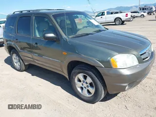 2002 Mazda Tribute LX with VIN 4F2CU08152KM02067, listed as a IAAI auction lot 42198970 with 212,613 mi miles and . Bid and sale history available at carsss.com. Image 1.