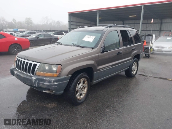 1999 Jeep Grand Cherokee Laredo с VIN 1J4G258S2XC768349, выставлен на аукционе IAAI как лот 41305102 с пробегом 136 848 миль миль и . История ставок и продаж доступна на DreamBid. Изображение 2.