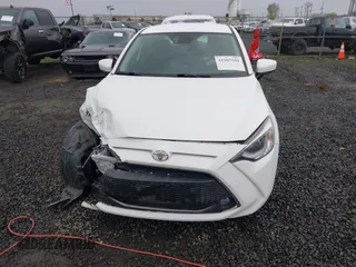 2019 Toyota Yaris L z VIN 3MYDLBYV5KY506616, wystawiony jako IAAI lot #41905500 z przebiegiem 62 758 mil mil oraz . Historia ofert i sprzedaży dostępna na DreamBid. Obrazek 12.