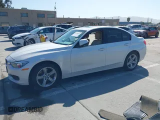 2014 BMW 3 Series 320i with VIN WBA3B1G50ENN90657, listed as a IAAI auction lot 42304612 with 129,377 mi miles and . Bid and sale history available at DreamBid. Image 19.