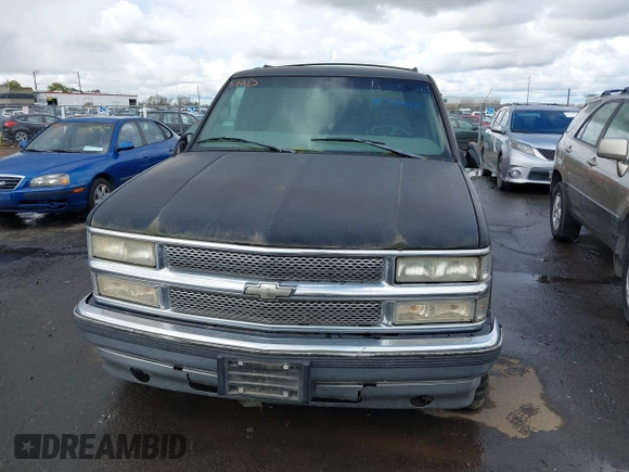 1999 Chevrolet Tahoe Z71 with VIN 1GNEK13R1XJ425996, listed as a IAAI auction lot 41798943 with 203,106 mi miles and . Bid and sale history available at DreamBid. Image 6.