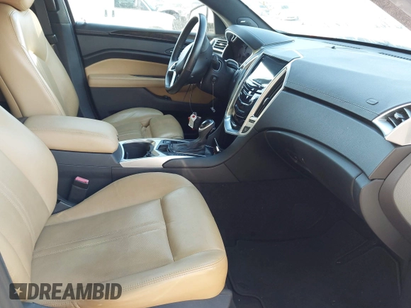 2014 Cadillac SRX Performance Collection with VIN 3GYFNCE36ES662689, listed as a IAAI auction lot 42109417 with 132,957 mi miles. Bid and sale history available at carsss.com. Image 5.