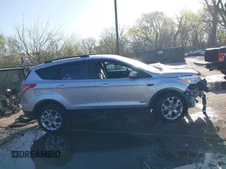 2013 Ford Escape SEL with VIN 1FMCU0HX4DUB98238, listed as a IAAI auction lot 41973221 with 131,590 mi miles and . Bid and sale history available at DreamBid. Image 14.