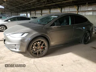 2016 Tesla Model X P90D with VIN 5YJXCAE45GF000398, listed as a Copart auction lot 52009715 with 90,239 mi miles and Clean Title. Bid and sale history available at carsss.com. Image 1.