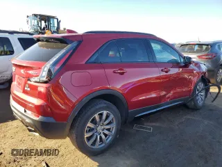 2022 Cadillac XT4 AWD Sport с VIN 1GYFZFR49NF130155, выставлен на аукционе Copart как лот 80286034 с пробегом 28 447 миль миль и Списание • Salvage title. История ставок и продаж доступна на DreamBid. Изображение 3.