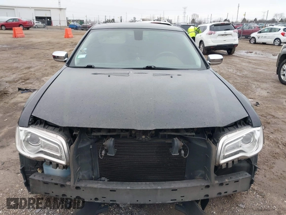 2016 Chrysler 300 with VIN 2C3CCAEG0GH348651, listed as a IAAI auction lot 41967981 with 141,728 mi miles. Bid and sale history available at carsss.com. Image 6.