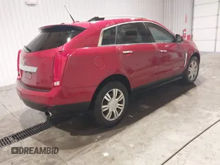 2011 Cadillac SRX Luxury Collection with VIN 3GYFNAEY8BS553596, listed as a IAAI auction lot 41286518 with 117,604 mi miles. Bid and sale history available at carsss.com. Image 4.