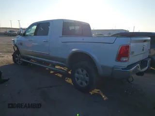 2014 Ram 2500 Longhorn with VIN 3C6UR5PL7EG191298, listed as a IAAI auction lot 40978191 with 156,686 mi miles. Bid and sale history available at carsss.com. Image 3.