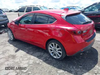 2014 Mazda 3 S Grand Touring z VIN JM1BM1M32E1100092, wystawiony jako IAAI lot #42248984 z przebiegiem 139 937 mil mil oraz . Historia ofert i sprzedaży dostępna na DreamBid. Obrazek 3.