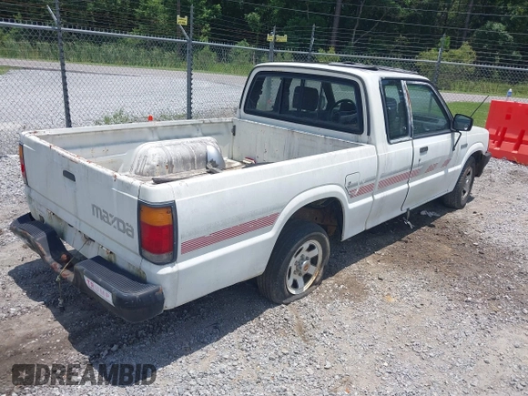 1991 Mazda B-Series Truck z VIN JM2UF3133M0169084, wystawiony jako IAAI lot #42511871 z przebiegiem 175 426 mil mil oraz . Historia ofert i sprzedaży dostępna na DreamBid. Obrazek 4.