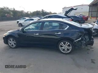 2014 Nissan Altima SL with VIN 1N4BL3AP7EC165164, listed as a IAAI auction lot 41159064 with 152,307 mi miles and . Bid and sale history available at DreamBid. Image 14.