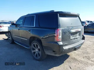 2016 GMC Yukon Denali with VIN 1GKS2CKJ8GR337441, listed as a IAAI auction lot 41485647 with 171,874 mi miles. Bid and sale history available at carsss.com. Image 3.