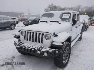 2023 Jeep Gladiator Overland z VIN 1C6HJTFG6PL544489, wystawiony jako IAAI lot #41311654 z przebiegiem 37 630 mil mil oraz . Historia ofert i sprzedaży dostępna na DreamBid. Obrazek 2.