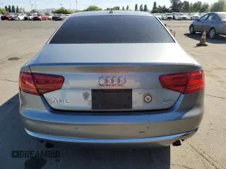 2012 Audi A8 z VIN WAURVAFD7CN023286, wystawiony jako Copart lot #56594745 z przebiegiem 199 443 mil mil oraz Czysty tytuł • Clean title. Historia ofert i sprzedaży dostępna na DreamBid. Obrazek 6.
