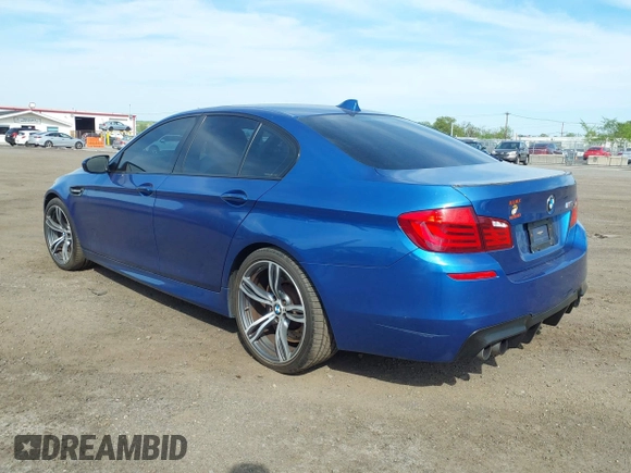 2013 BMW M5 with VIN WBSFV9C56DC774032, listed as a IAAI auction lot 42124754 with 55,409 mi miles. Bid and sale history available at carsss.com. Image 3.