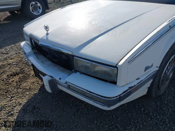 1989 Cadillac Eldorado with VIN 1G6EL1150KU621587, listed as a IAAI auction lot 42103841 with 129,711 mi miles and . Bid and sale history available at DreamBid. Image 6.