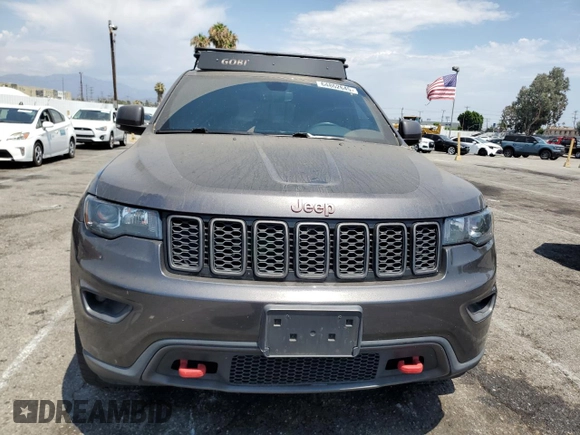 2019 Jeep Grand Cherokee Trailhawk z VIN 1C4RJFLG6KC759527, wystawiony jako Copart lot #64862645 z przebiegiem 76 079 mil mil oraz Szkoda całkowita • Salvage title. Historia ofert i sprzedaży dostępna na DreamBid. Obrazek 5.