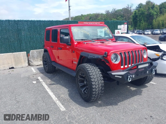 2021 Jeep Wrangler Unlimited Sahara z VIN 1C4HJXEGXMW631033, wystawiony jako IAAI lot #42550070 z przebiegiem 54 429 mil mil oraz . Historia ofert i sprzedaży dostępna na DreamBid. Obrazek 1.