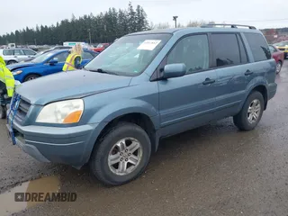 2005 Honda Pilot EX with VIN 2HKYF18465H565524, listed as a IAAI auction lot 41927812 with 218,637 mi miles. Bid and sale history available at carsss.com. Image 2.