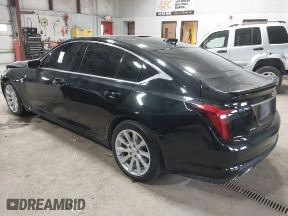 2021 Cadillac CT5 Luxury z VIN 1G6DX5RK0M0147667, wystawiony jako IAAI lot #41398726 z przebiegiem 50 387 mil mil oraz . Historia ofert i sprzedaży dostępna na DreamBid. Obrazek 3.