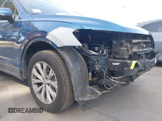 2019 Volkswagen Tiguan SE with VIN 3VV3B7AX2KM067907, listed as a IAAI auction lot 41841360 with 19,269 mi miles and . Bid and sale history available at DreamBid. Image 6.