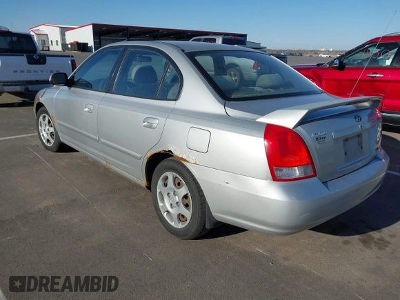 2003 Hyundai Elantra GLS z VIN KMHDN45D63U553542, wystawiony jako IAAI lot #42032294 z przebiegiem 164 210 mil mil oraz . Historia ofert i sprzedaży dostępna na DreamBid. Obrazek 3.