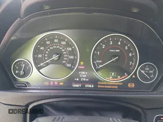 2014 BMW 4 Series 435i with VIN WBA3T3C59EP737612, listed as a IAAI auction lot 42260394 with 104,877 mi miles and . Bid and sale history available at DreamBid. Image 7.