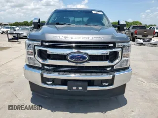 2022 Ford F-250 XL with VIN 1FT8W2BTXNEE16815, listed as a Copart auction lot 61967185 with 116,527 mi miles and Salvage title. Bid and sale history available at DreamBid. Image 5.