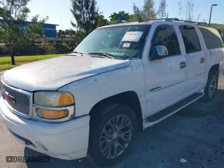 2006 GMC Yukon XL Denali with VIN 1GKFK66U56J142191, listed as a IAAI auction lot 41862921 with 147,655 mi miles. Bid and sale history available at carsss.com. Image 2.