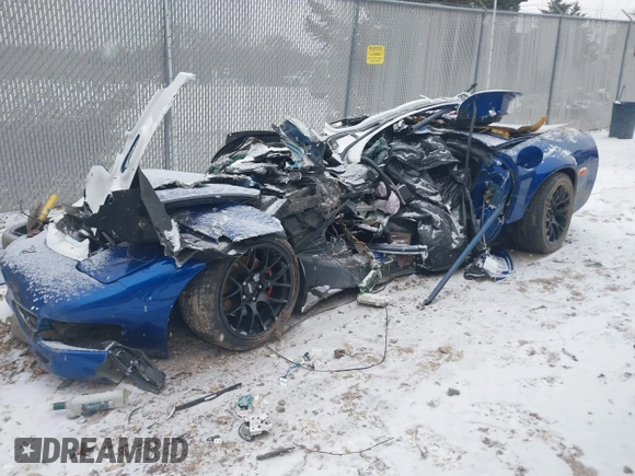 2002 Chevrolet Corvette Z06 z VIN 1G1YY12S625120934, wystawiony jako IAAI lot #41368156 z przebiegiem Nie podano mil oraz . Historia ofert i sprzedaży dostępna na DreamBid. Obrazek 17.