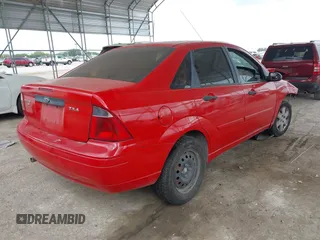 2007 Ford Focus S z VIN 1FAFP34N07W282022, wystawiony jako IAAI lot #42126281 z przebiegiem Nie podano mil oraz . Historia ofert i sprzedaży dostępna na DreamBid. Obrazek 4.